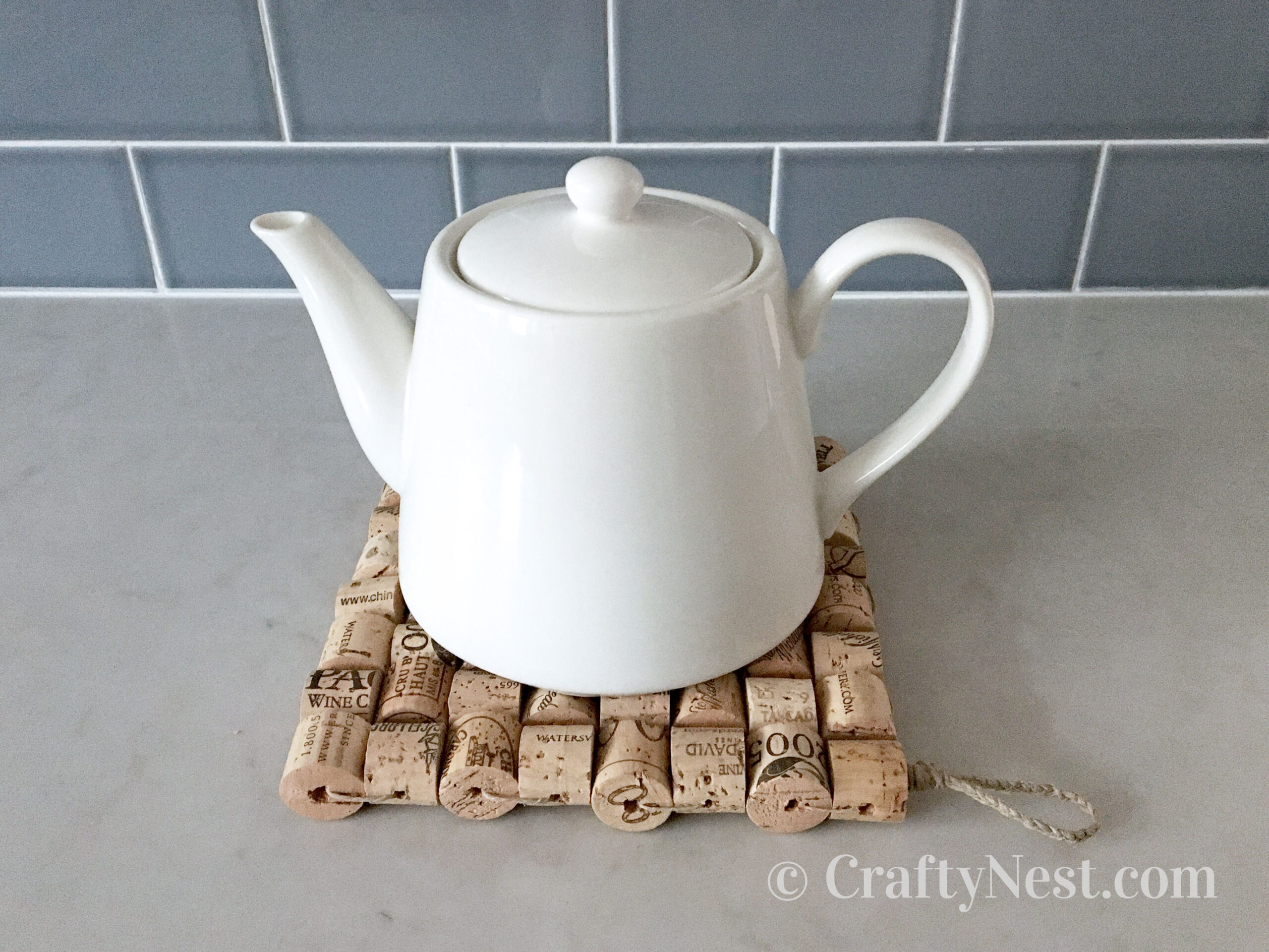 DIY Woven Wine-cork Trivet With Loop Hanger - Crafty Nest